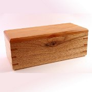 Oak box with paela accents and lid.